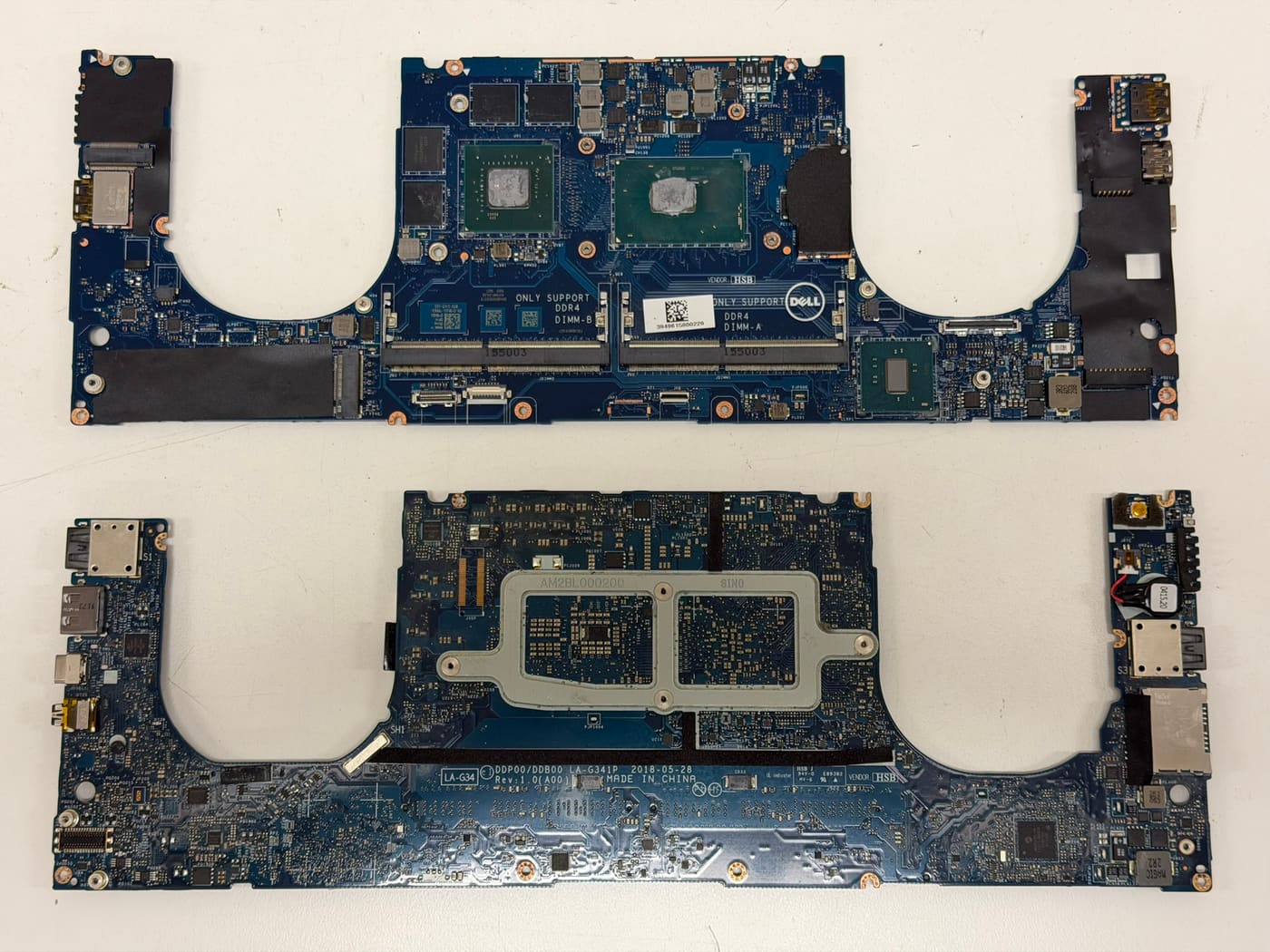 Two Dell XPS motherboards on our Perth bench for board-level repair